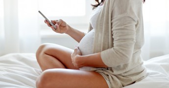 Pregnant woman, smartphone, women's health